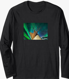 **Teepee Night Sky TEE** A glowing teepee under a star-filled northern lights sky. Rooted in nature’s beauty and traditional ways, this design shares peace, art, and timeless spirit.